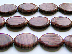 velk ovl z red wooden line stone